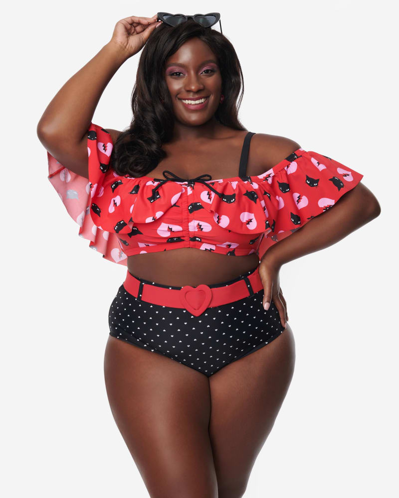 Black polka dot bikini bottoms top